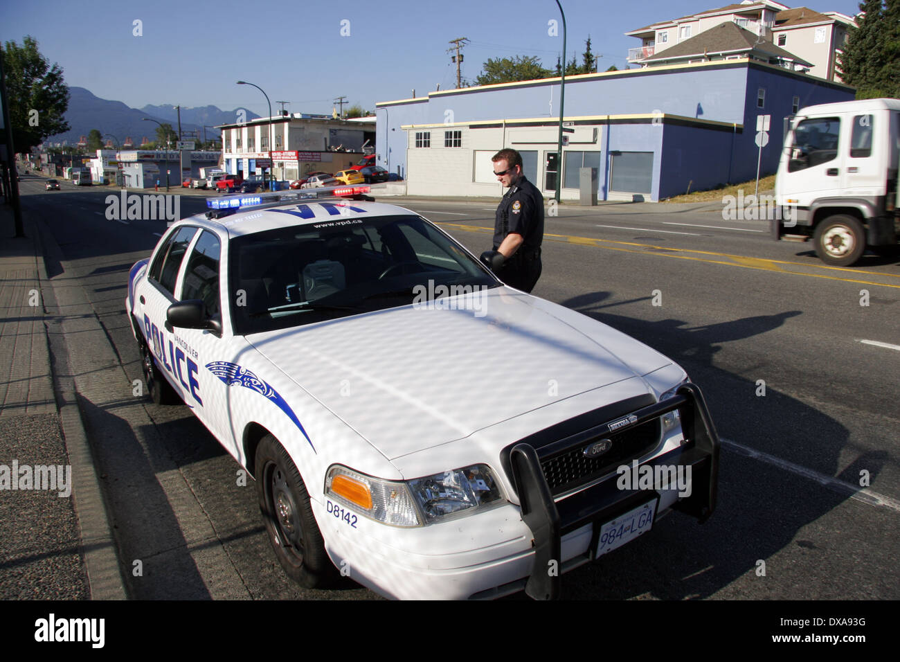 A Vancouver Police Department cop at his car, Vancouver, British