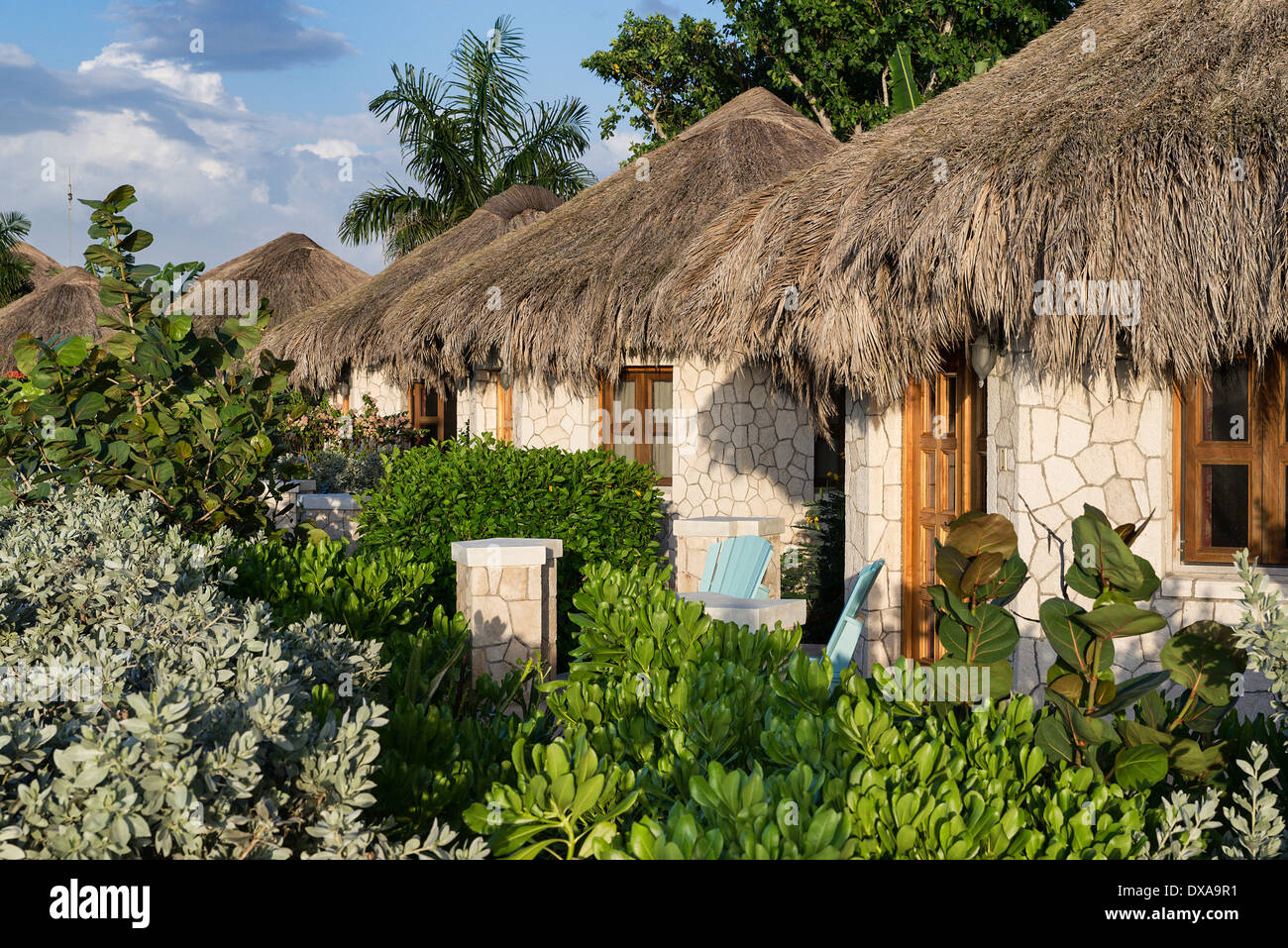 The Spa Retreat boutique hotel cottages with thatched roof. Stock Photo