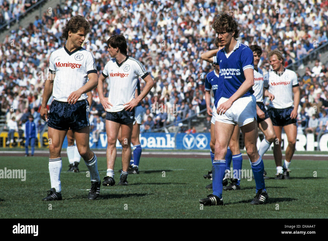 football, 2. Bundesliga, 1983/1984, Park Stadium, FC Schalke 04 versus Karlsruher SC 3:3, scene of the match, f.l.t.r. Uwe Buehler (KSC), Wolfgang Schueler (KSC), Michael Jakobs (S04), Hans-Juergen Boysen (KSC), Michael Kuenast (KSC) Stock Photo