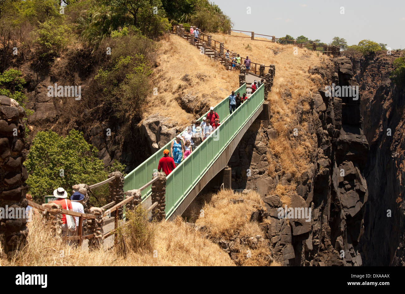 Visitors crossing Knifeedge bridge Victoria Falls Livingstone Zambia