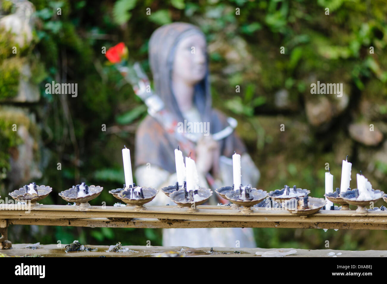Candles at a holy shrine Stock Photo Alamy