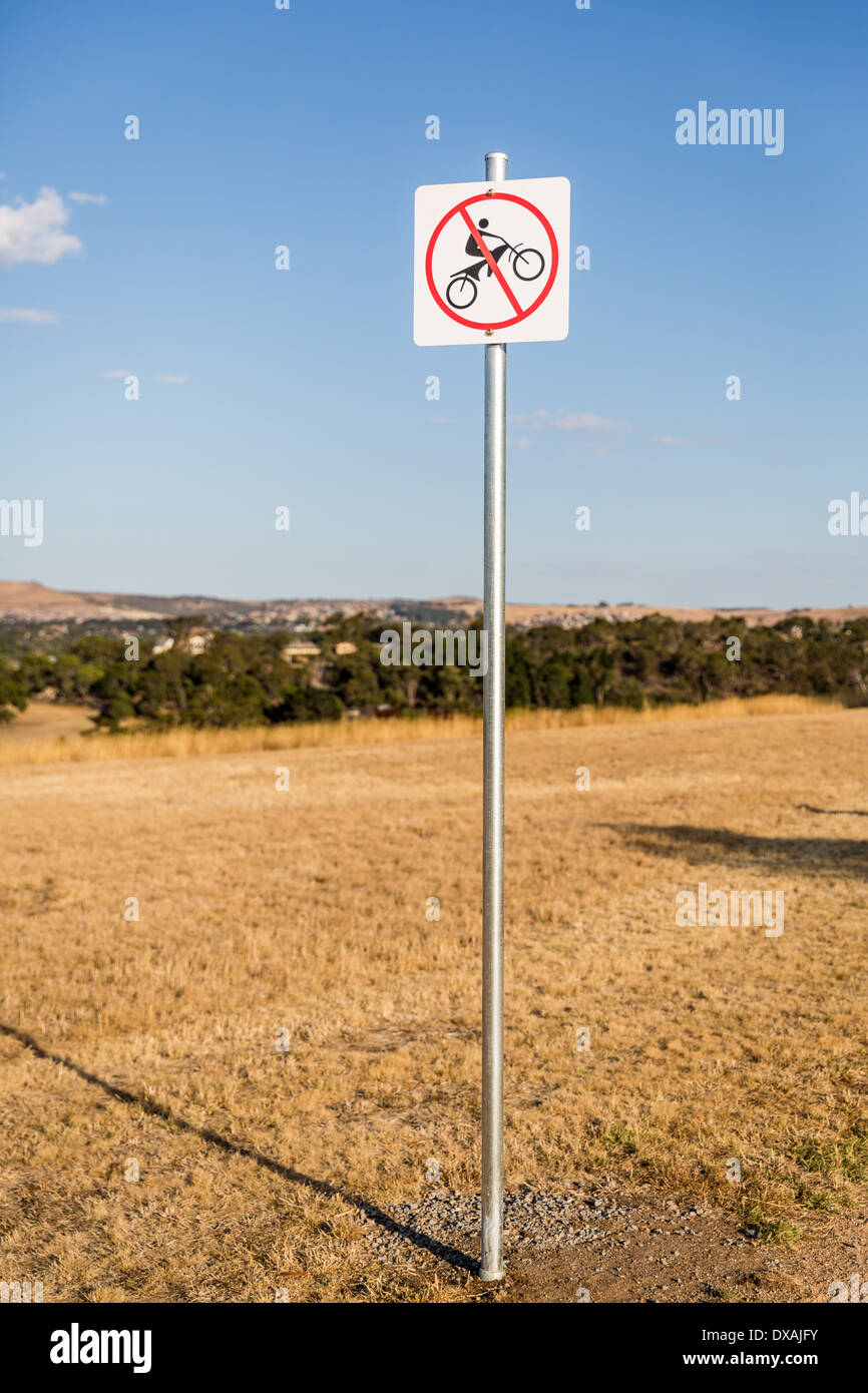 No Motorbikes warning sign in park. Stock Photo