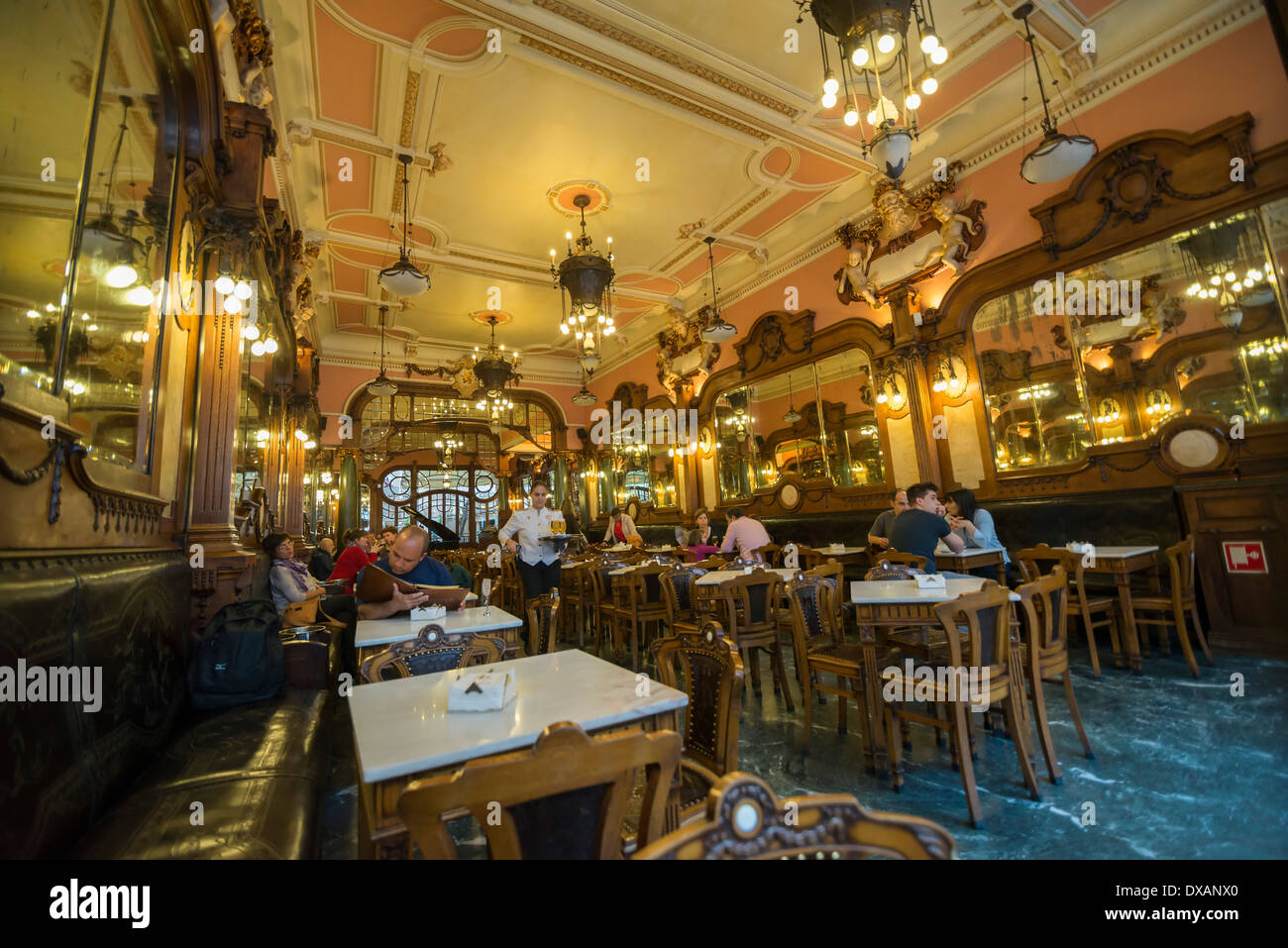PORTO, PORTUGAL - MARCH  11: People at the Majestic Cafe on March 11, 2014. Stock Photo