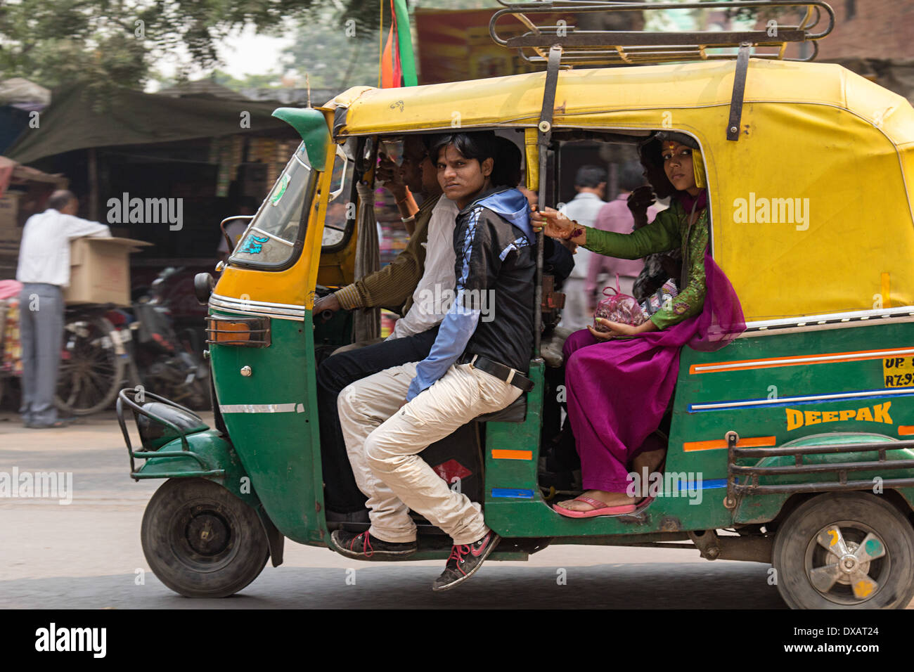 Indian passengers in Auto Rickshaw in Agra, India Stock Photo