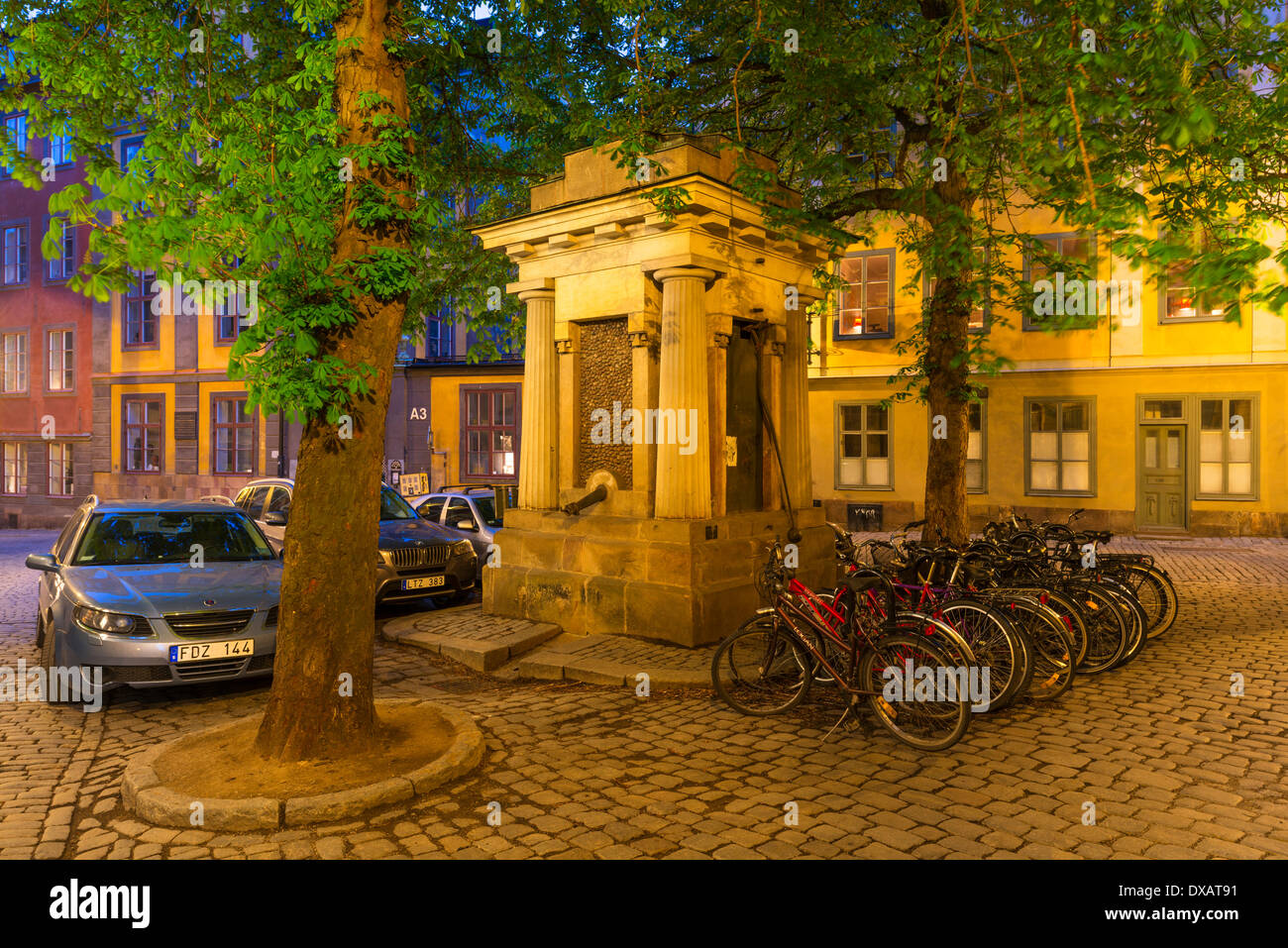 Tyska Brunnsplan, a small triangular square with a historic well in Gamla Stan, The old town, of Stockholm, Sweden. Stock Photo