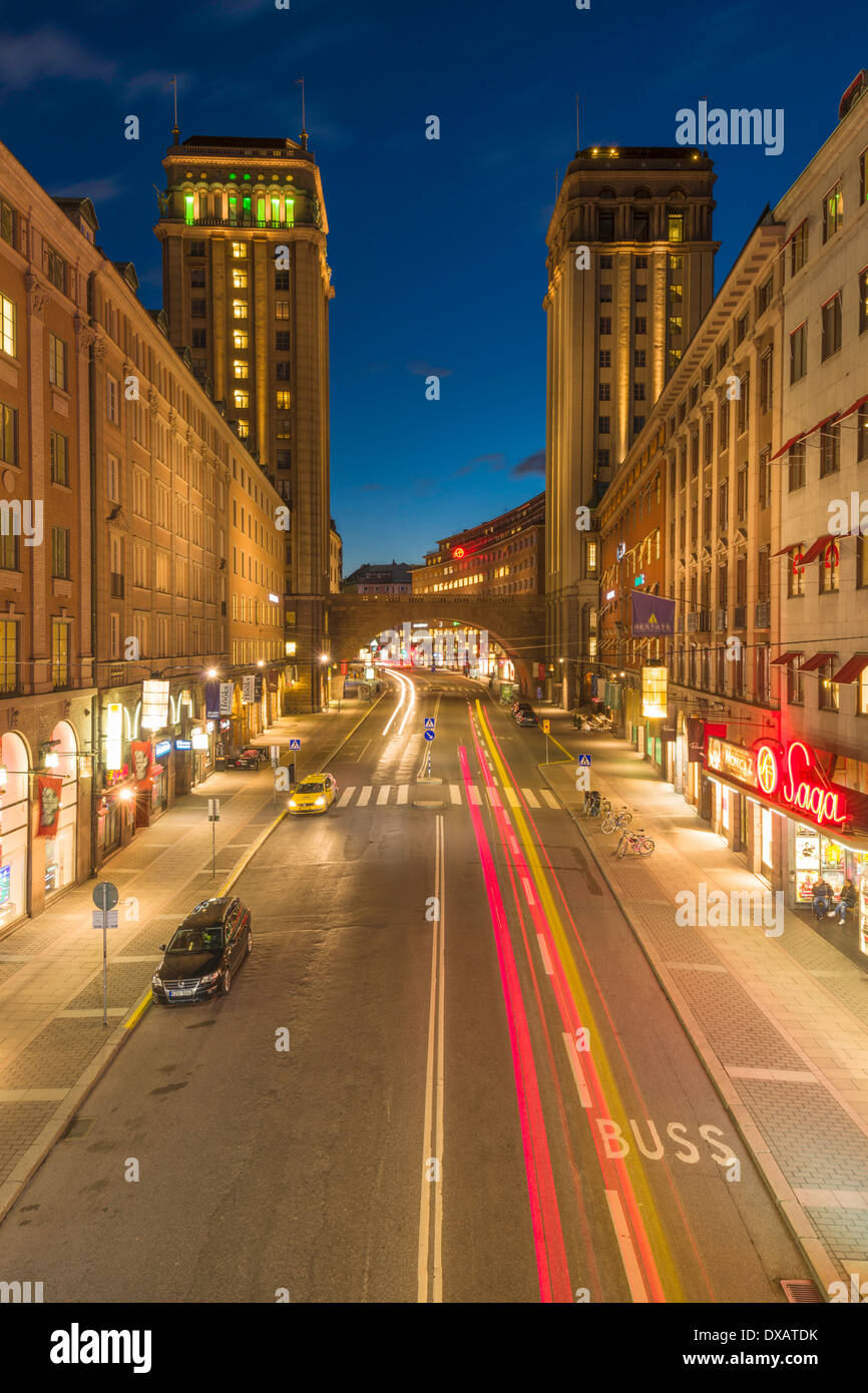 Evening view of Kungsgatan, a main street in central Stockholm.  It is flanked by 2 tower buildings, Kungstorn ("King's Towers") Stock Photo