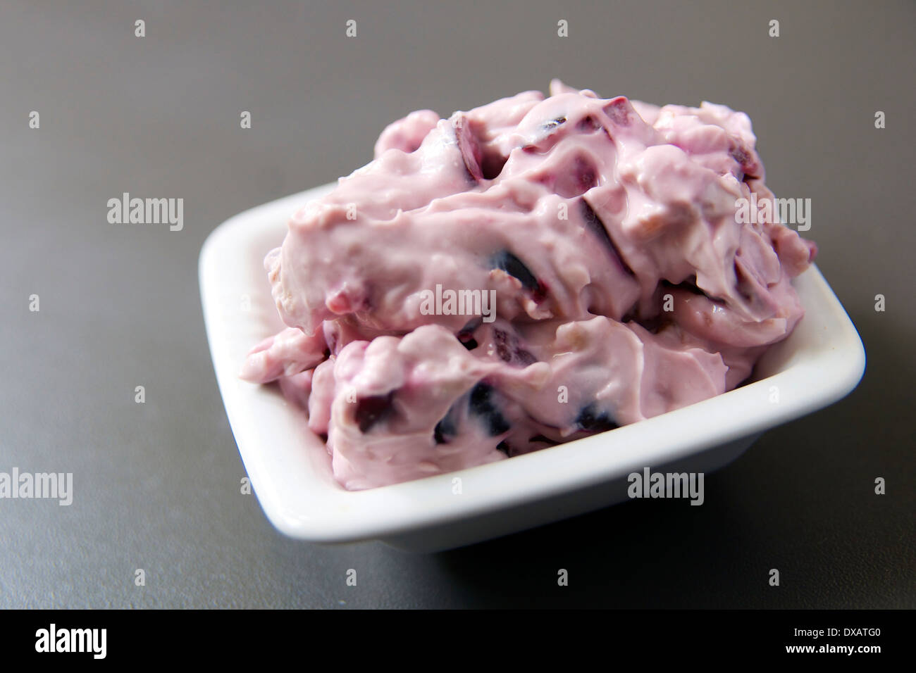 Home made creamy spread with cherries, walnuts and vegan cream cheese. Stock Photo