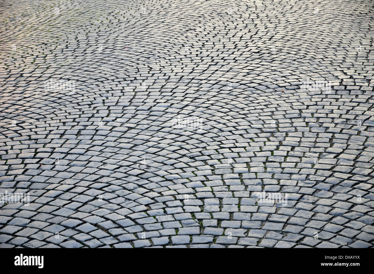 The old square is paved with stone setts. Stock Photo