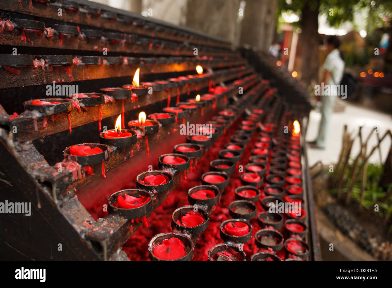 Red praying candles Stock Photo Alamy