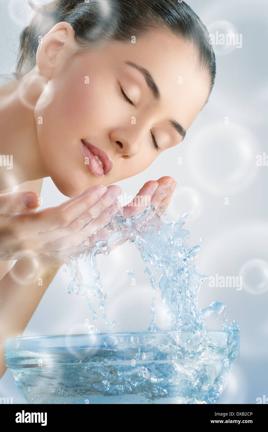 beautiful girl washes his face Stock Photo Alamy