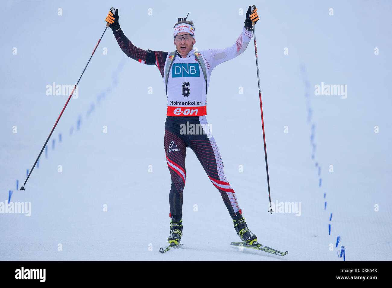 Oslo, Norway. 22nd March 2014.  E.ON World Cup Biathlon 2014 Simon Eder of Austria wins the men's 12.5 kilometre pursuit during the World Cup Biathlon at Holmenkollen in Oslo, Norway. Credit:  Action Plus Sports Images/Alamy Live News Stock Photo