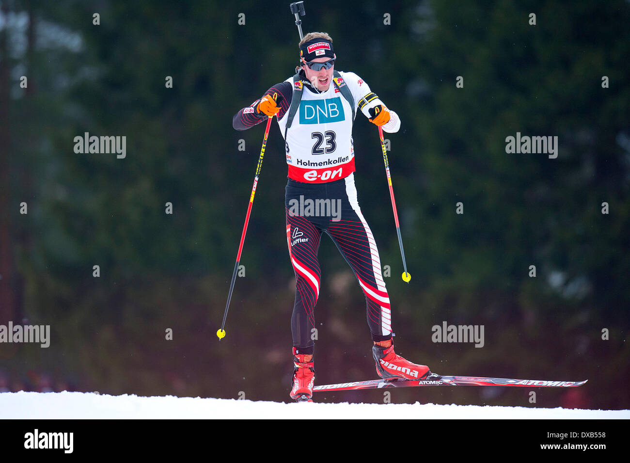 Oslo, Norway. 22nd March 2014.  E.ON World Cup Biathlon 2014 Dominik Landertinger of Austria competes in the men's 12.5 kilometre pursuit during the World Cup Biathlon at Holmenkollen in Oslo, Norway. Credit:  Action Plus Sports Images/Alamy Live News Stock Photo