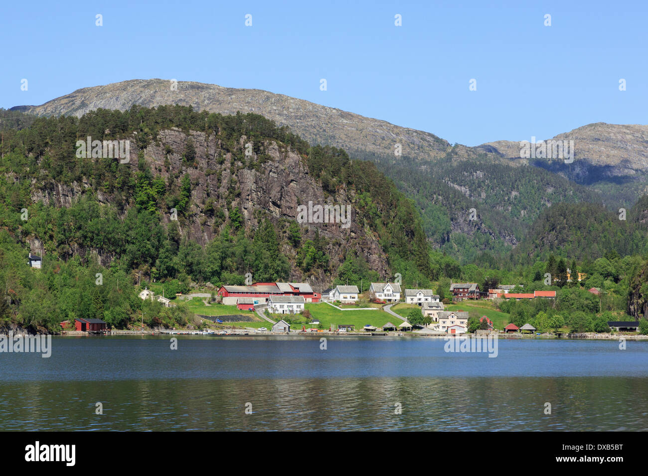 Farm and village houses on Norwegian coast, Osterfjorden fjord near Bergen, Hordaland, Norway, Scandinavia Stock Photo