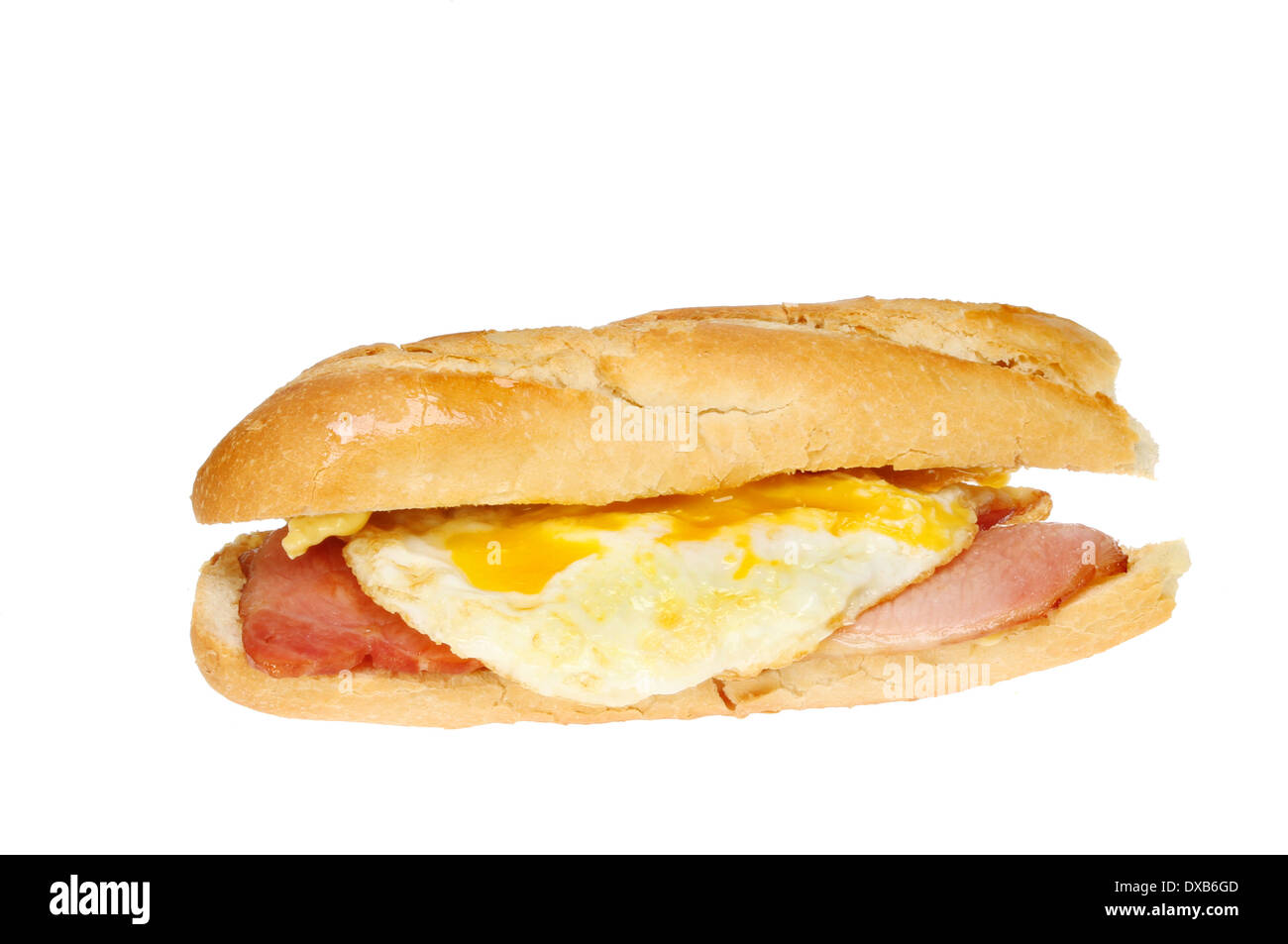 Fried egg and bacon baguette isolated against white Stock Photo