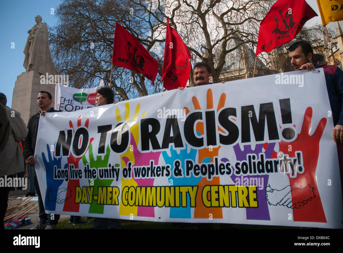 London, UK. 22nd March 2014. People gathered at Old Palace Yard hold up a No To Racism banner prior to the Anti-Racism rally setting off for Trafalgar Square in central London. Credit:  Peter Manning/Alamy Live News Stock Photo