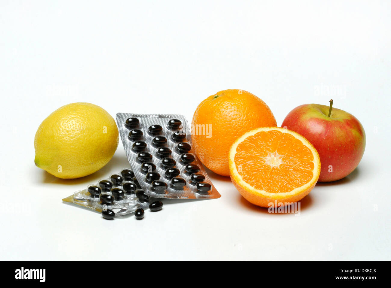 Fruit and nutritional supplement Stock Photo