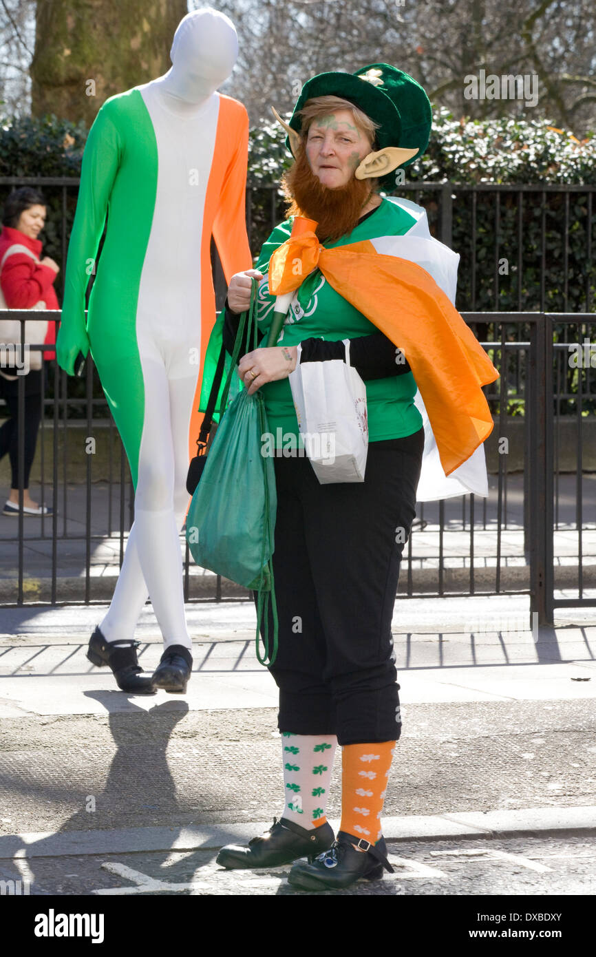 Man in a Irish Colored Morphsuit in London for the St Patrick's day Parade Stock Photo