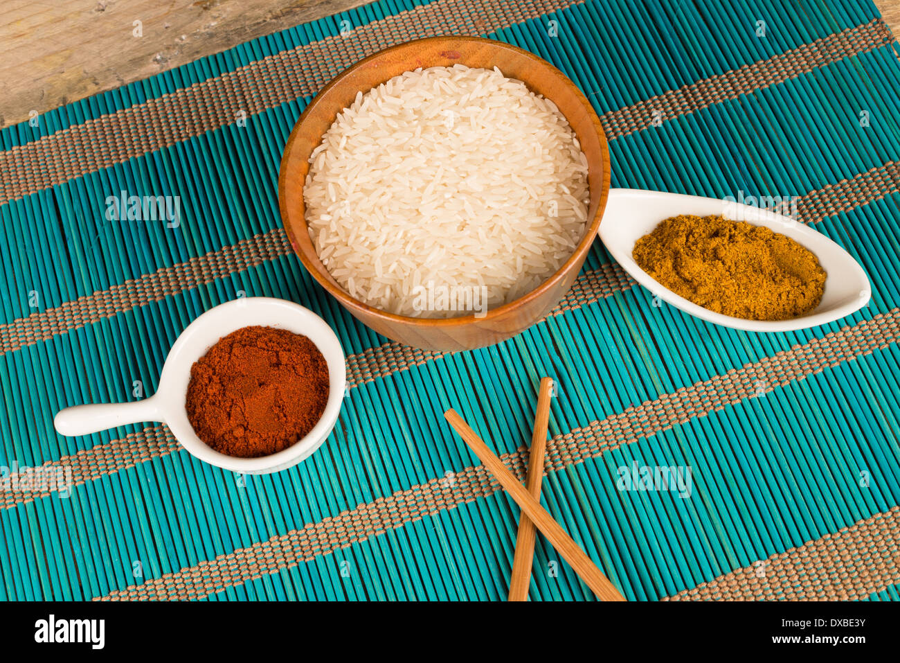 Rice and hot spices, Asian food staples Stock Photo - Alamy