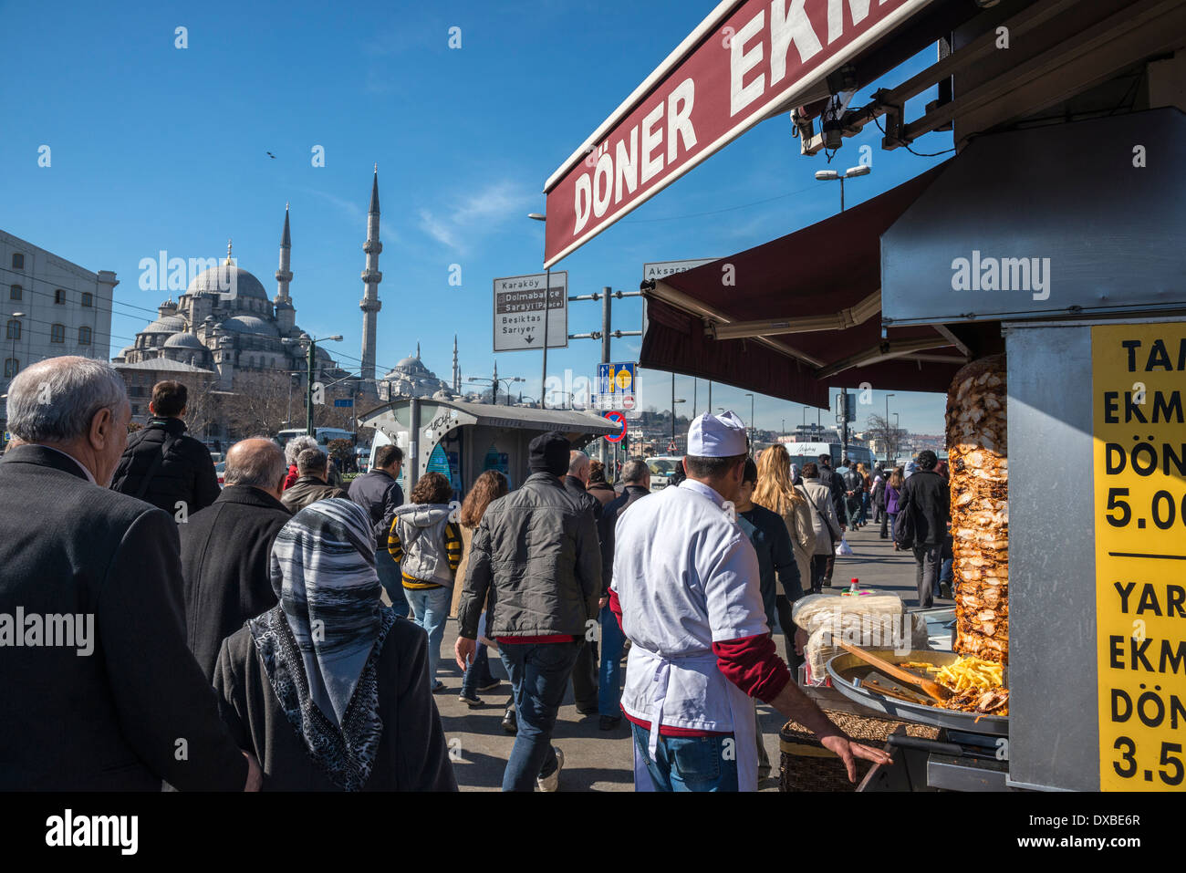 Kebab vendor on the quay at Eminonu by Galata bridge, with the Suleymaniye  & Yeni mosques in the background. Istanbul, Turkey Stock Photo - Alamy