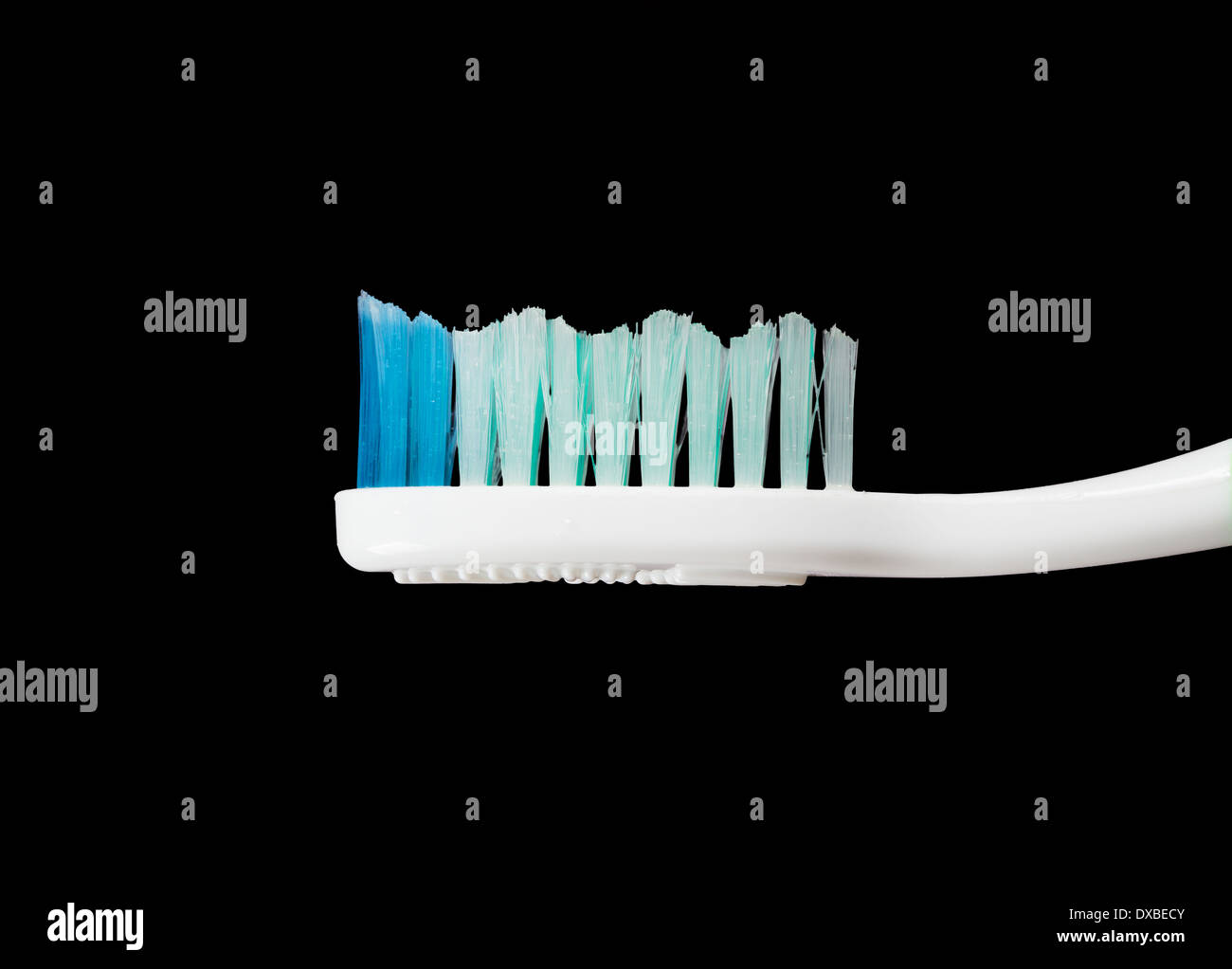 Toothbrush on the isolated black background Stock Photo