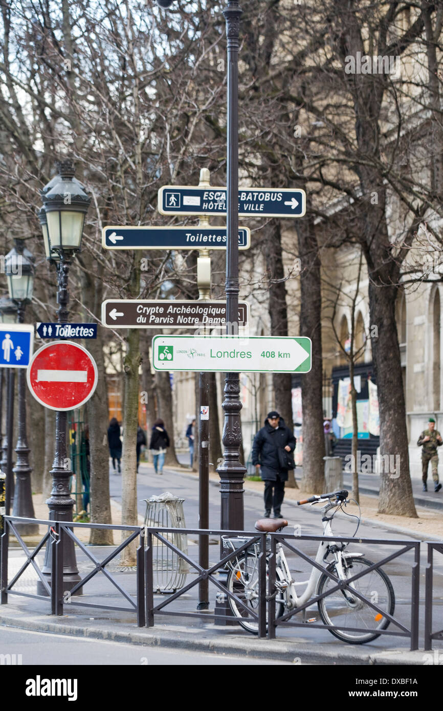 Sign post giving out information for Pedestrians in and Tourists in Paris France Stock Photo