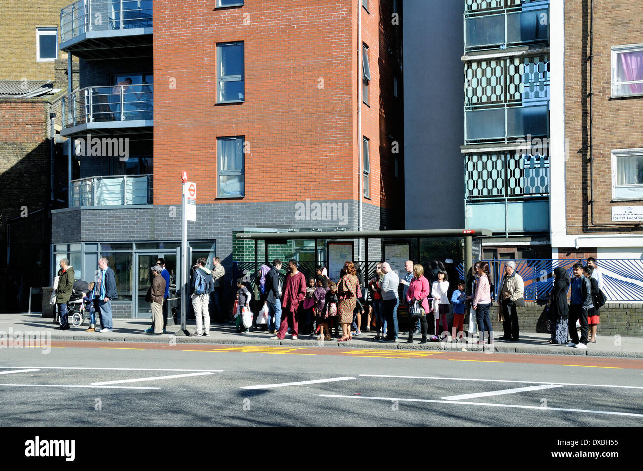 Bus Queue at stop, Burdett Road, Mile End, London Borough of Tower Hamlets, England Britain UK Stock Photo