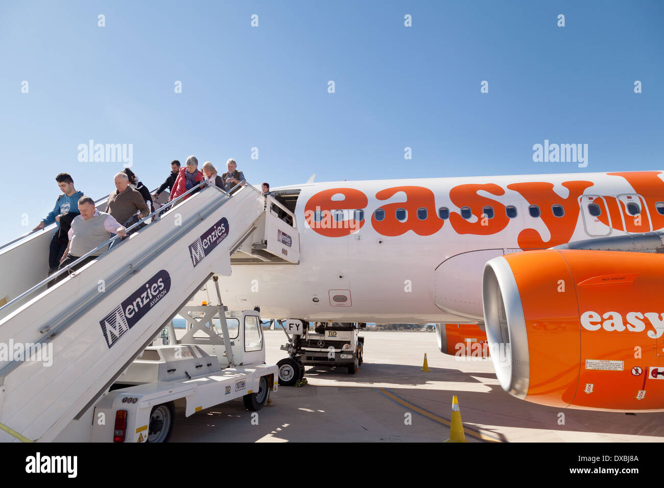 Easyjet plane, passengers getting off or disembarking from the flight, Almeria airport Spain Europe Stock Photo