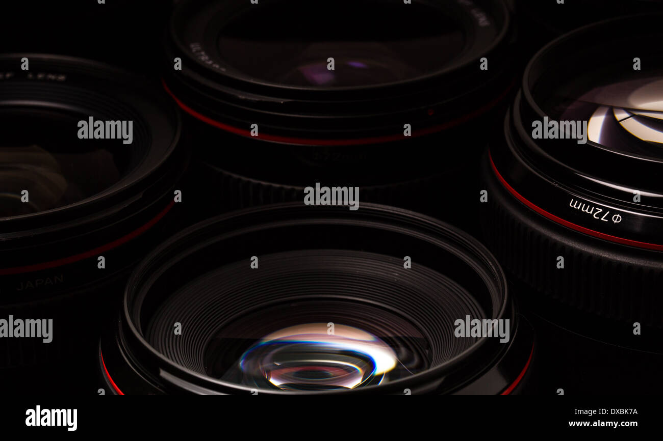 Modern camera lenses with reflections, low key image Stock Photo - Alamy