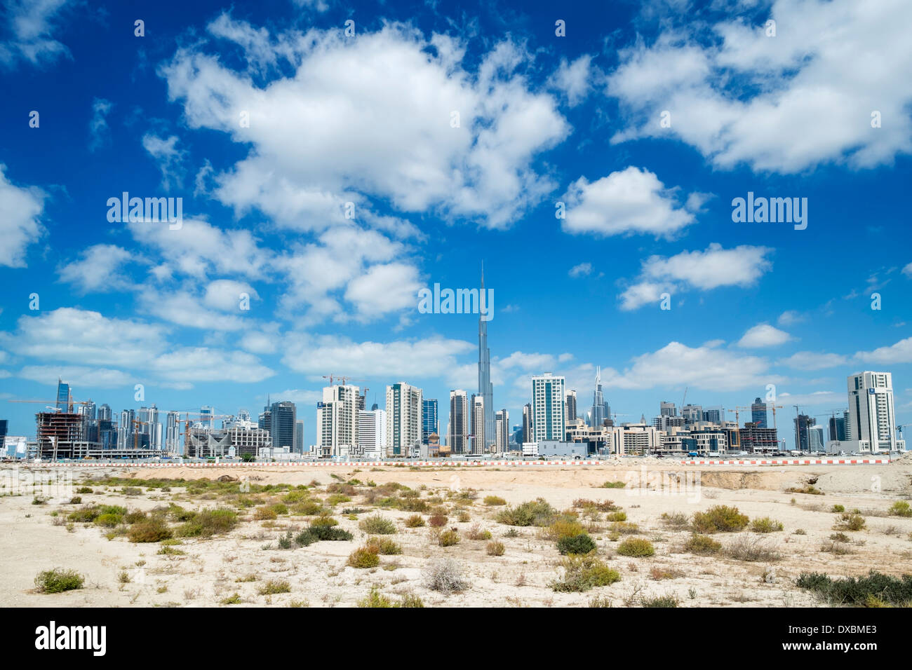 Skyline of Dubai from the desert in United Arab Emirates Stock Photo