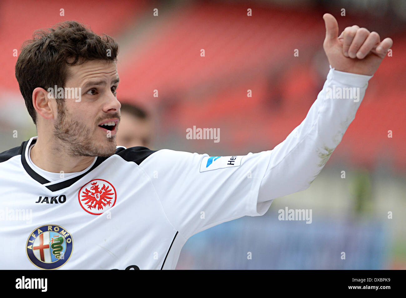 Frankfurt's Tranquillo Barnetta celebrates after the Bundesliga soccer match between 1. FC Nuerenberg and Eintracht Frankfurt at the Grundig Stadion in Nuerenberg, Germany, 23  March 2014. Pinola got the red card after this. Photo: Rene Ruprecht/dpa (ATTENTION: Due to the accreditation guidelines, the DFL only permits the publication and utilisation of up to 15 pictures per match on the internet and in online media during the match.) Stock Photo