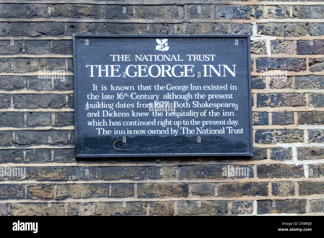 Historic Southwark Sign with information about The George Inn - a galleried traditional pub in Borough, London Stock Photo