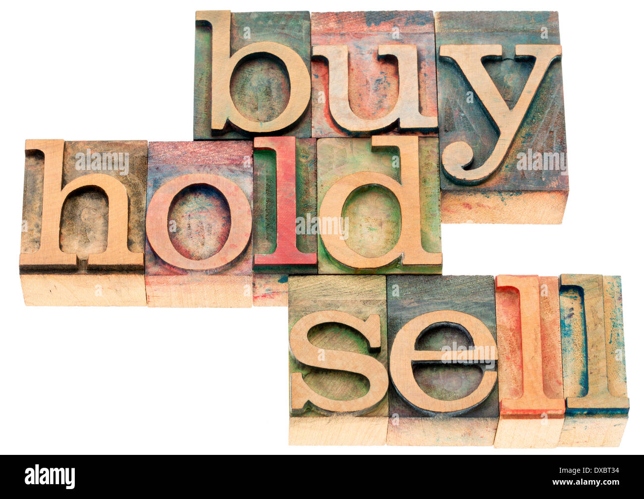 buy, hold, sell - investing concept - isolated text in letterpress wood type printing blocks stained by color inks Stock Photo