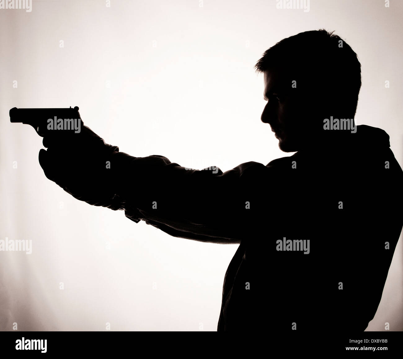 Man holding gun Stock Photo