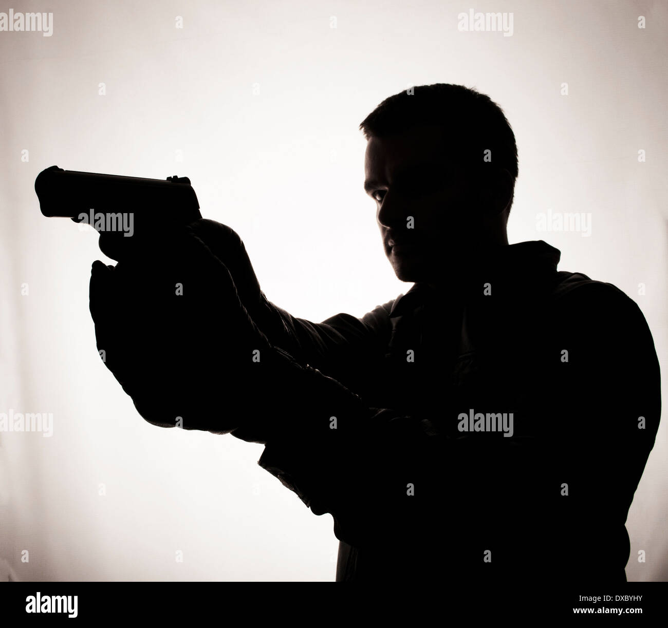 Man holding gun Stock Photo