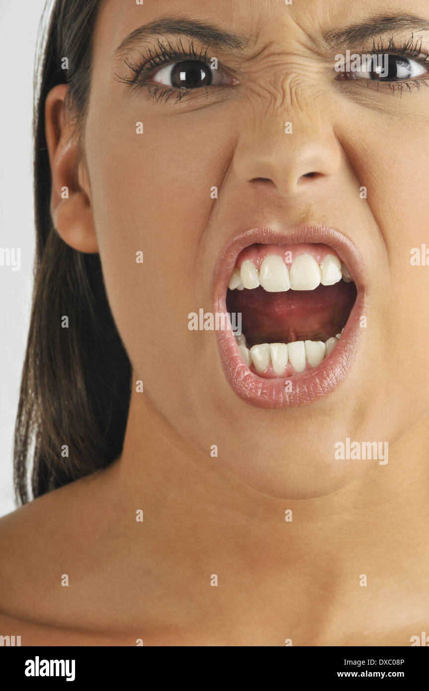 Female young adult face, shouting Stock Photo - Alamy