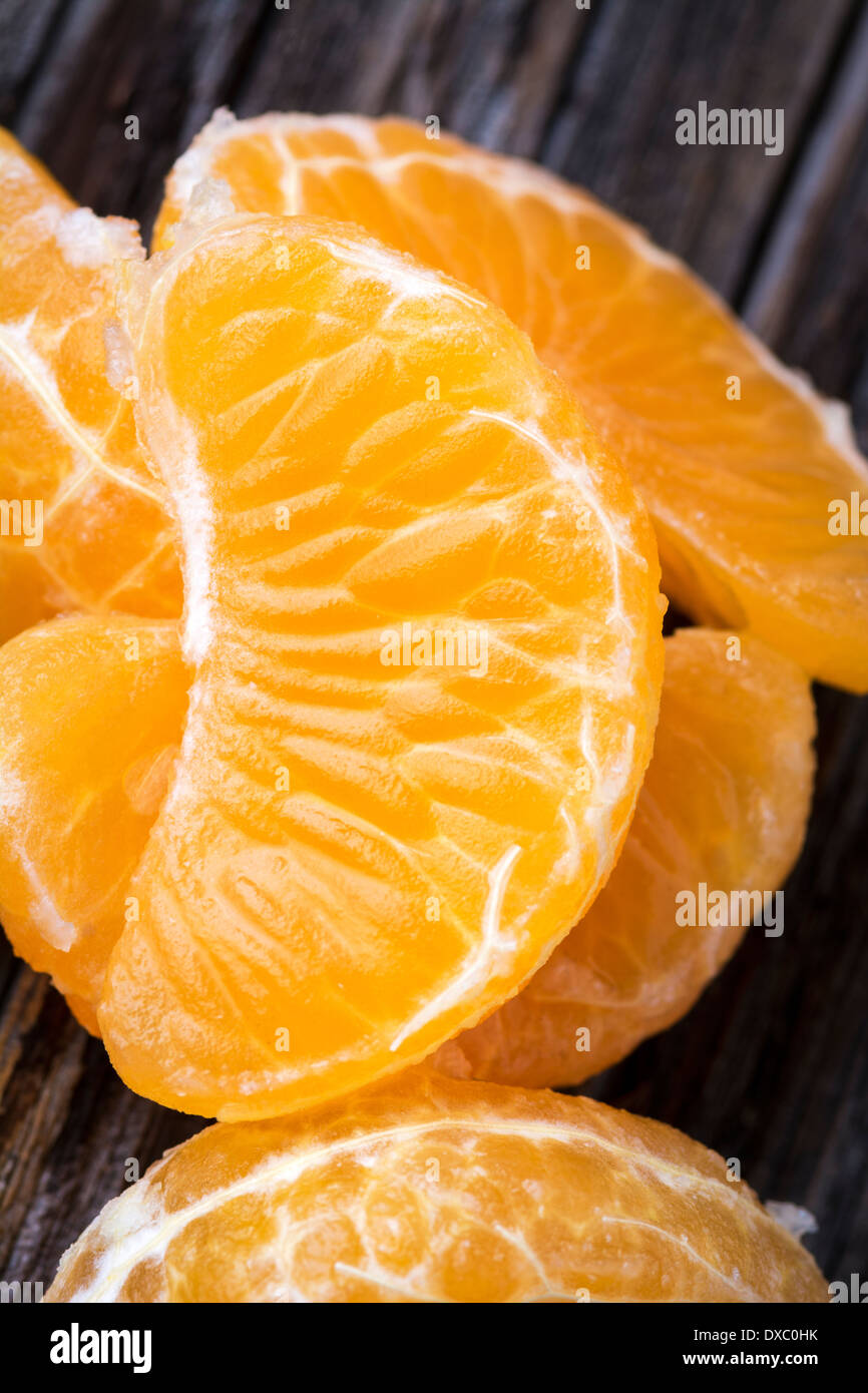 Mandarin or clementine tangerine orange segments in macro Stock Photo