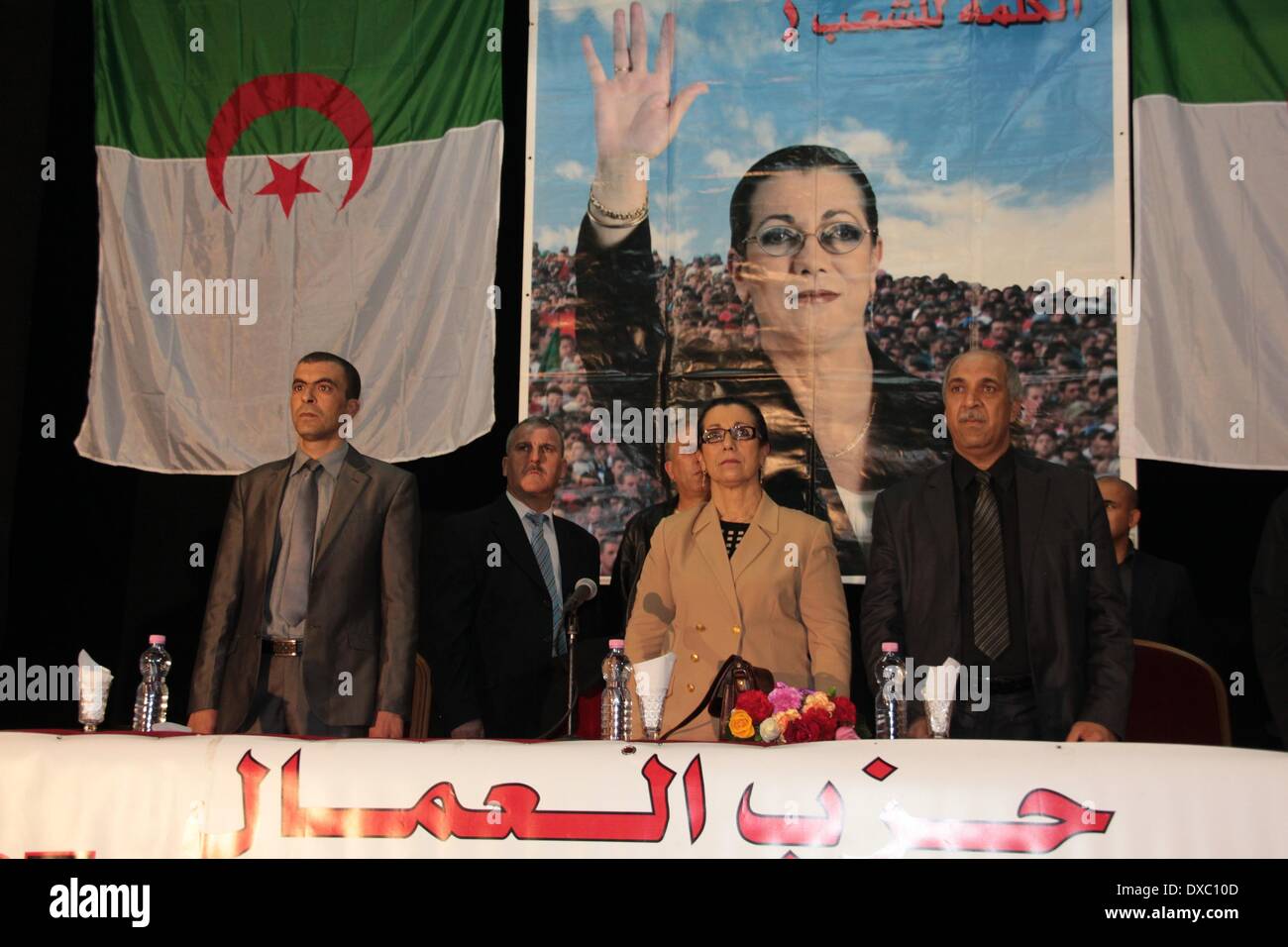 Algiers, Algeria. 23rd Mar, 2014. Leader of Workers' Party (PT) Louisa Hanoune (2nd R), candidate in the forthcoming presidential election, attends an election rally campaign, in Annaba, Algeria, March 23, 2014. Campaigning for Algeria's upcoming presidential election kicked off on Sunday and will run until April 13. © STR/Xinhua/Alamy Live News Stock Photo