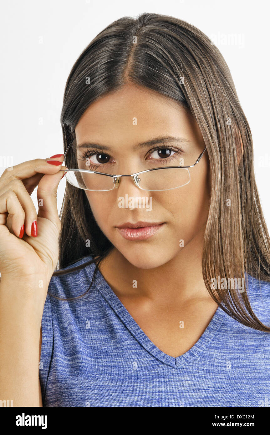 Look Over Spectacles Female young adult looking over eyeglasses Stock Photo - Alamy