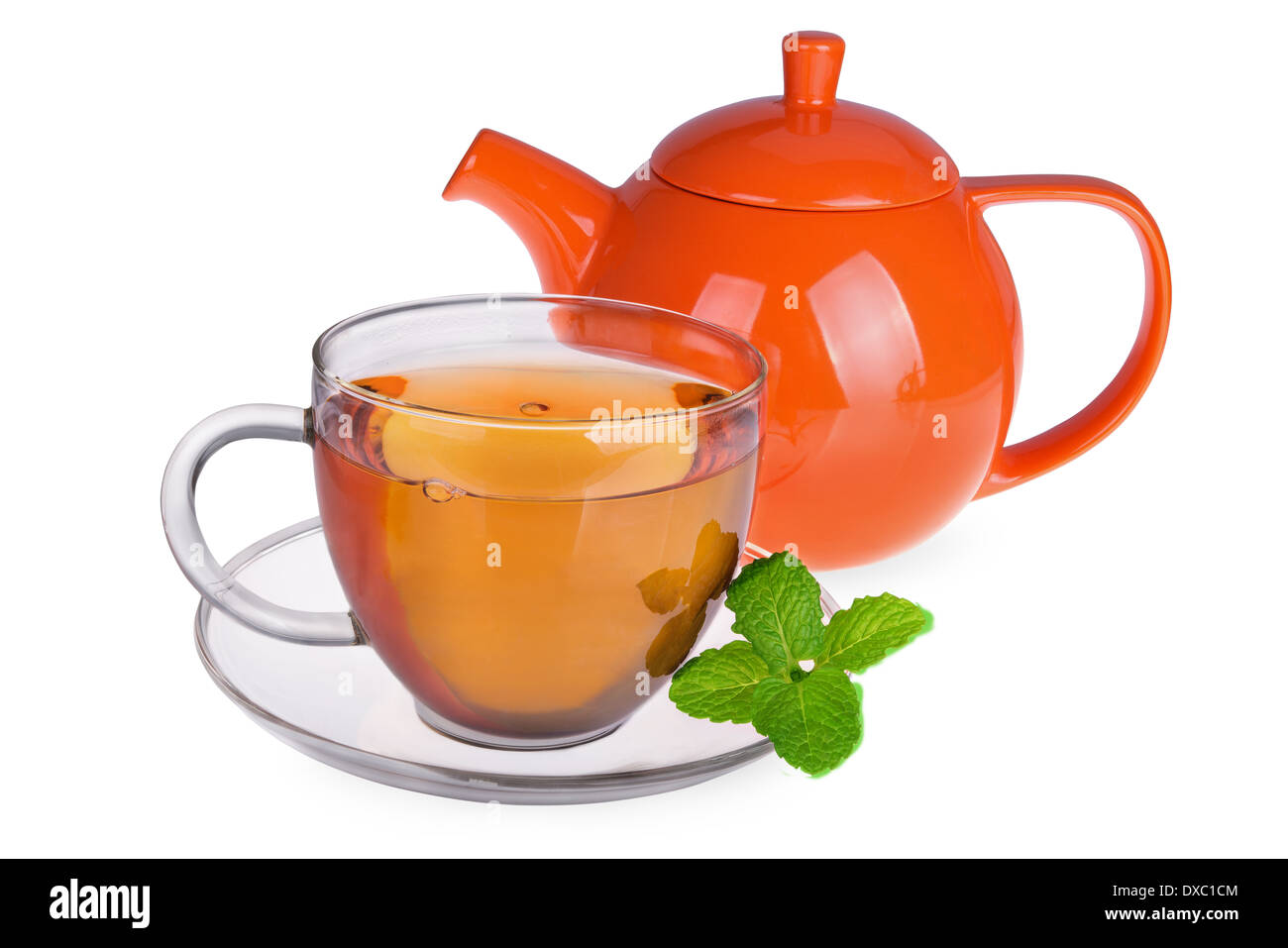 Glass cup of tea with mint leaves and orange teapot isolated on white background Stock Photo