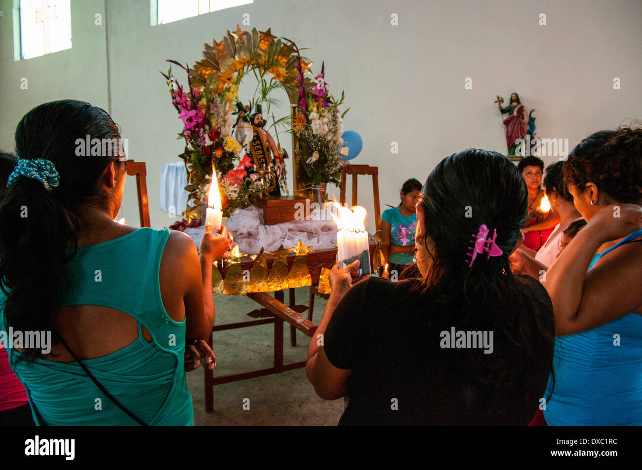 St. Stephen devout Christians praying in church. Yapatera, Piura. Peru. Stock Photo