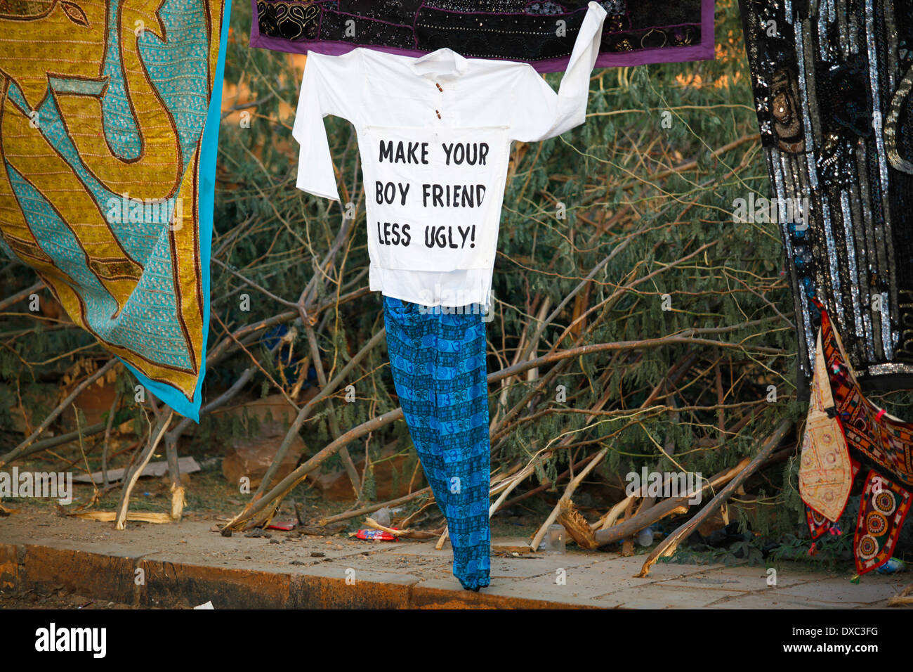 Funny t - shirt outside an Indian shop Stock Photo