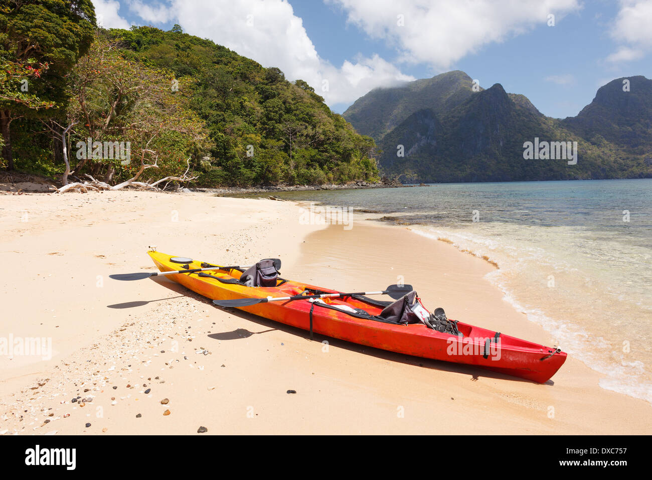 Sea kayak at the lonely sandy beach Stock Photo