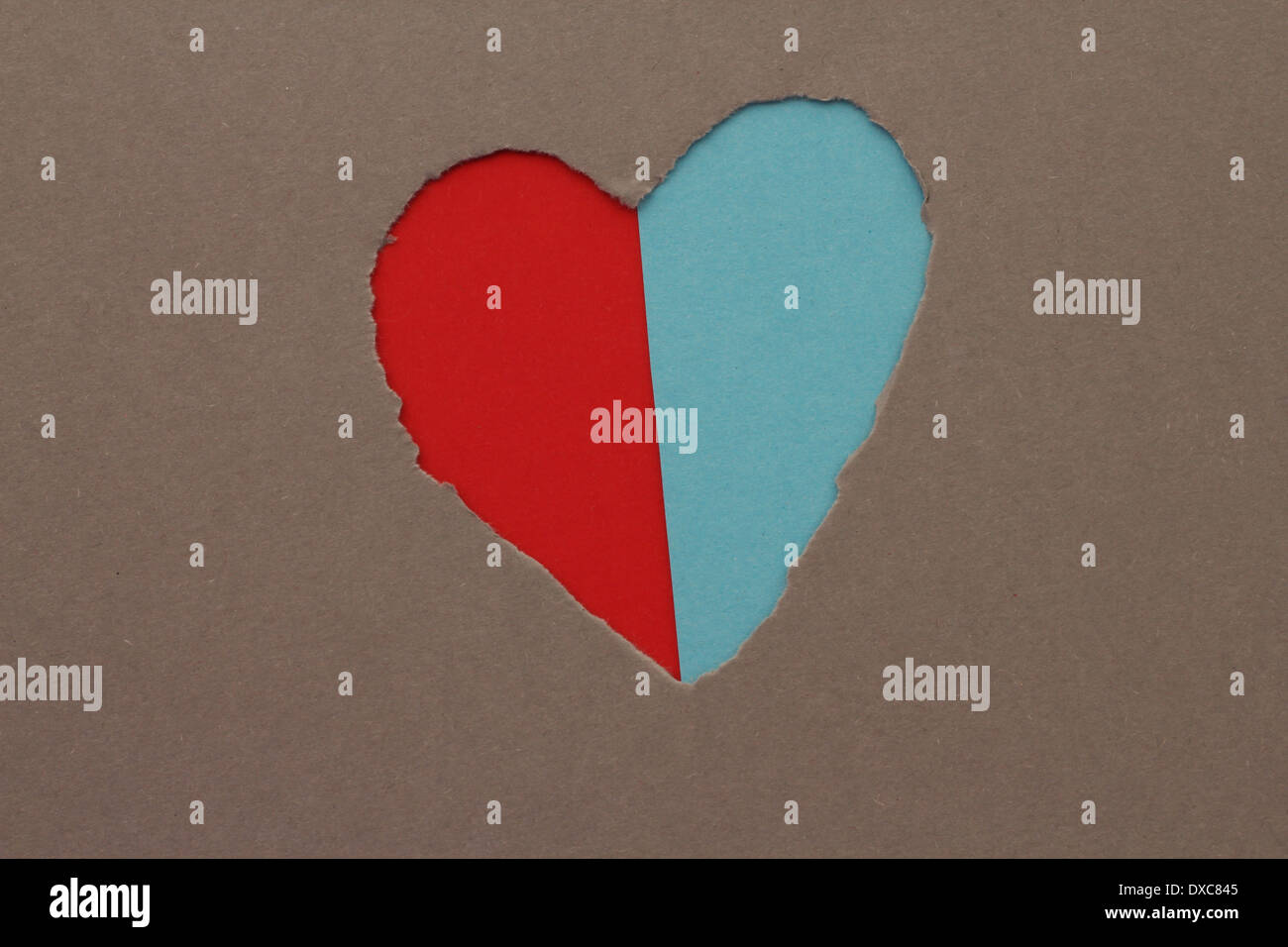 Torn red heart in paper with copy space Stock Photo - Alamy