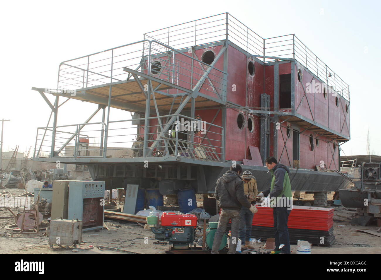 It's Noah's Ark! On the south bank of the Tarim River in Xinjiang Province, China, a man named Lu Zhenhai has built an ark in a Stock Photo