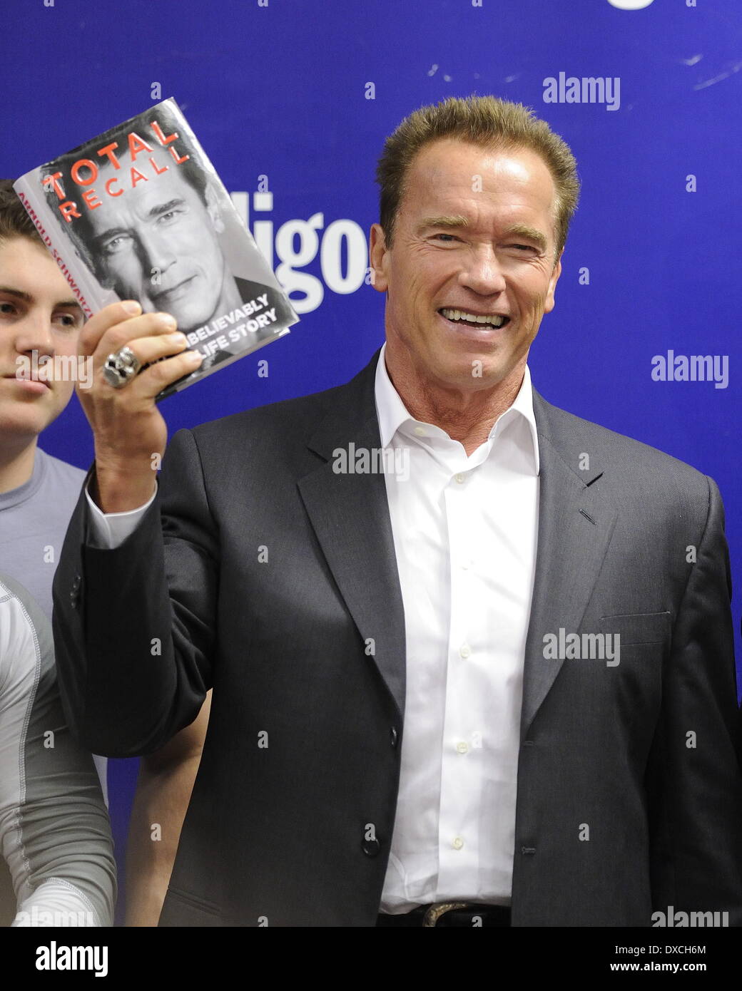 Arnold Schwarzenegger attends a book signing at Indigo Manulife Centre