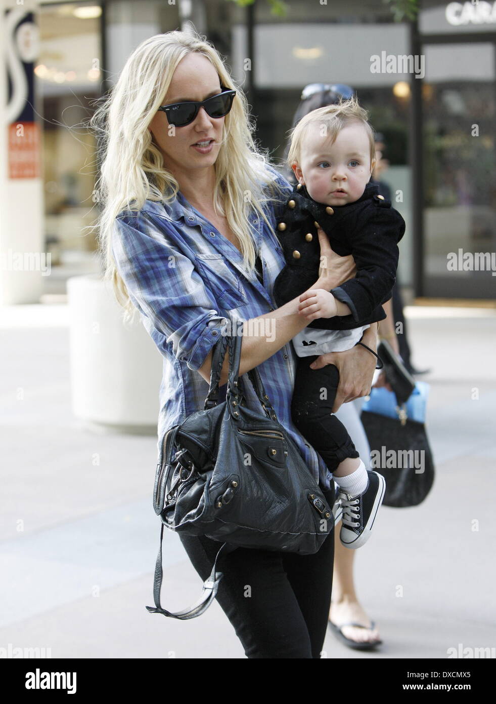 Kimberly Stewart and daughter Delilah Del Toro exit Newsroom Cafe on Robertson Boulevard Los Angeles, California- 05.10.12 Feat Stock Photo