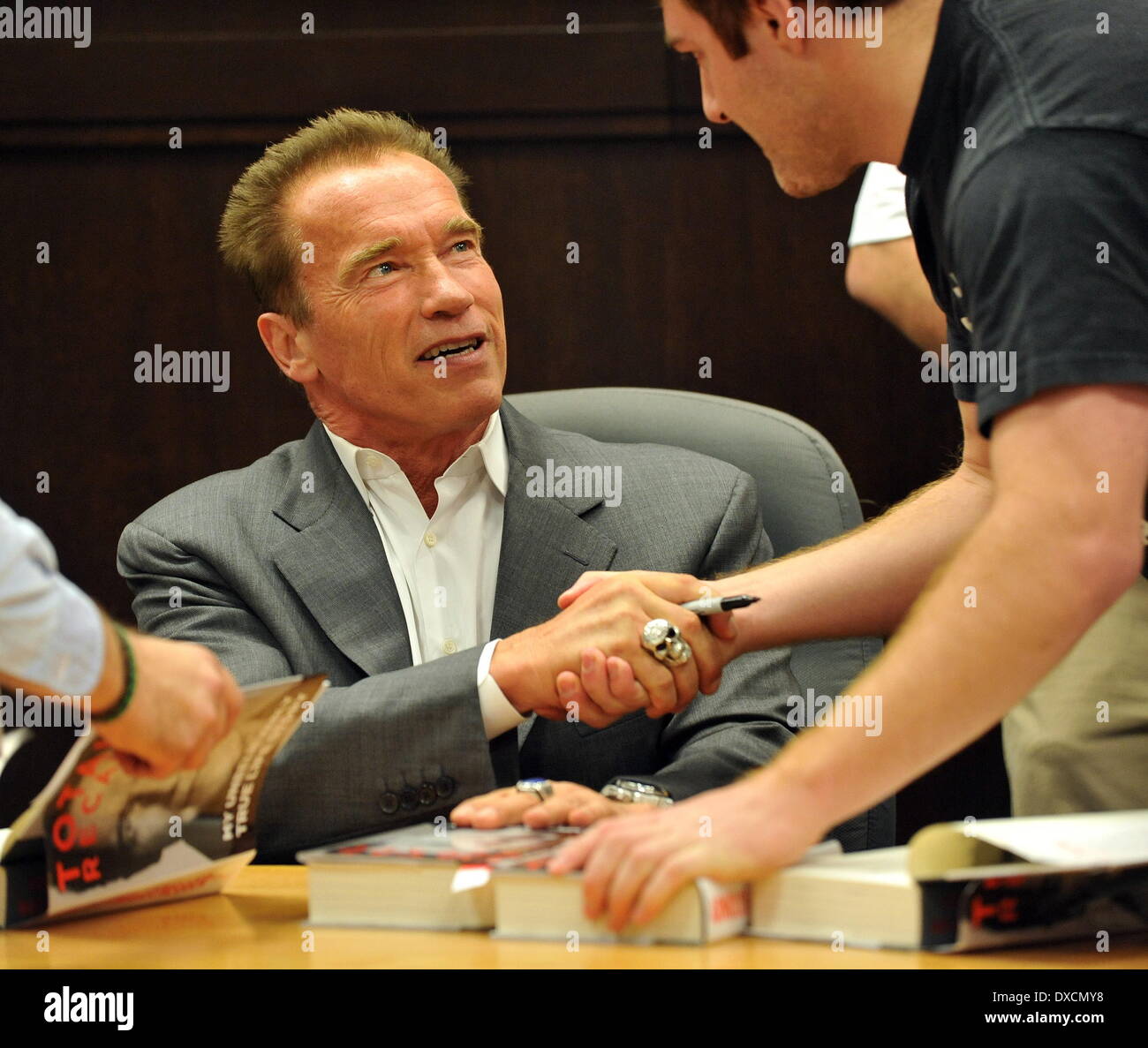 Arnold Schwarzenegger attends a book signing at The Grove for his