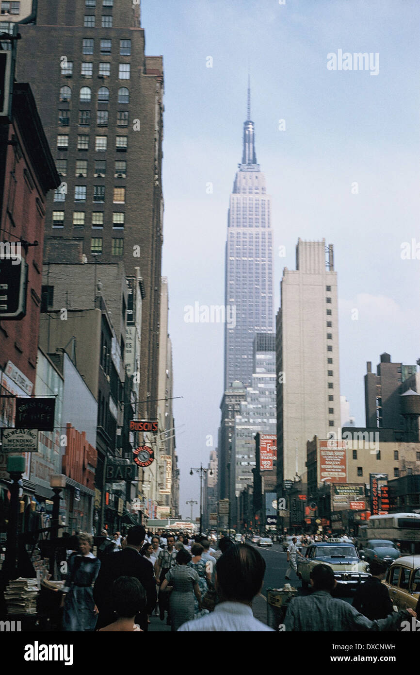 New York street with Empire State Building, 1958 Stock Photo