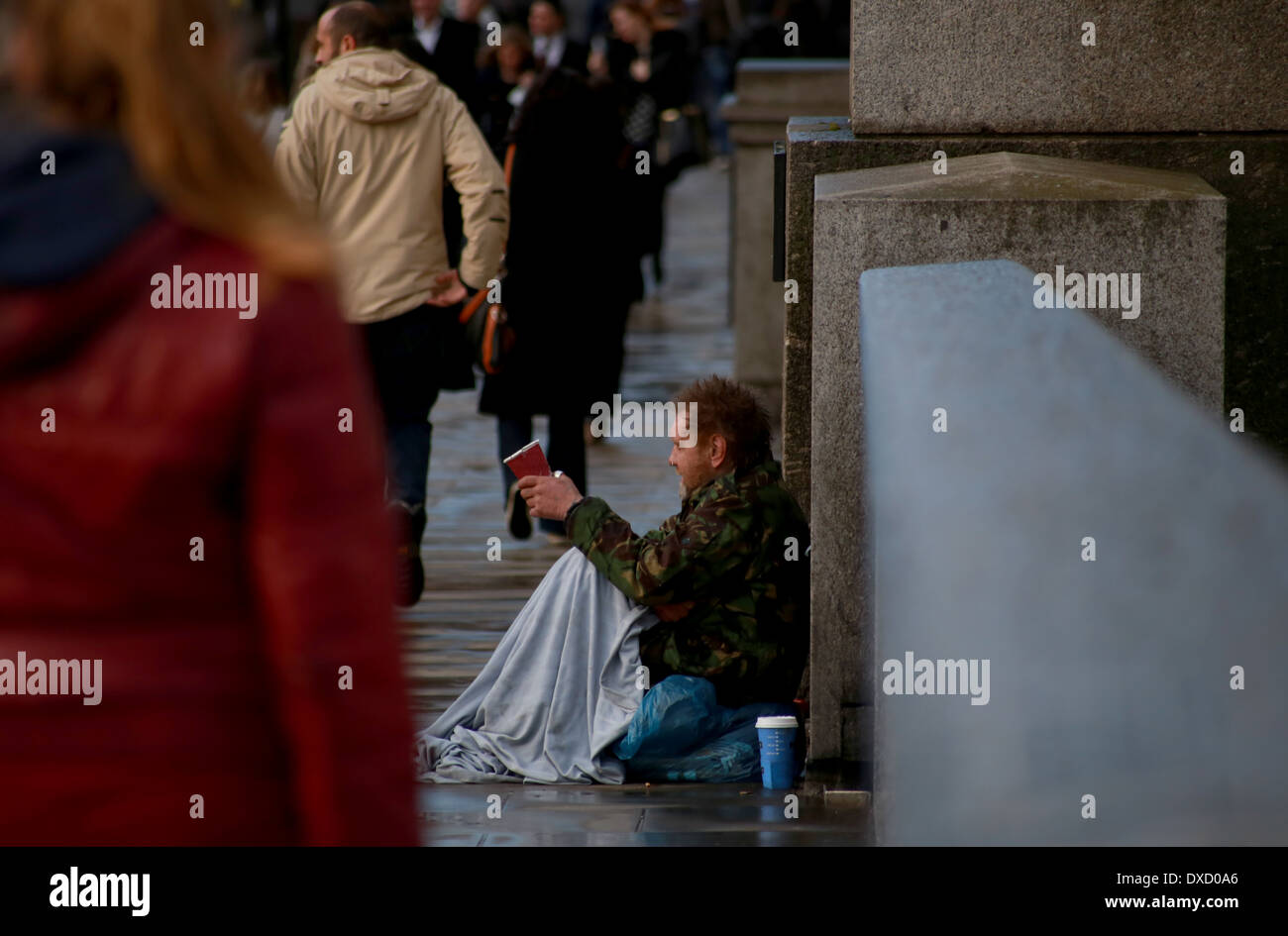 Poor white caucassian man begging in London Bridge street Stock Photo