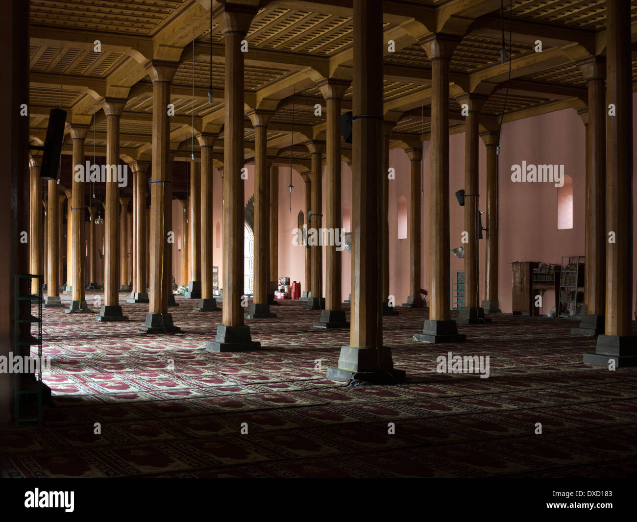 India, Kashmir, Srinagar, cedar pillars of historic Jamia Masjid mosque interior, built 1394 Stock Photo
